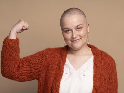 smiley-strong-woman-fighting-breast-cancer